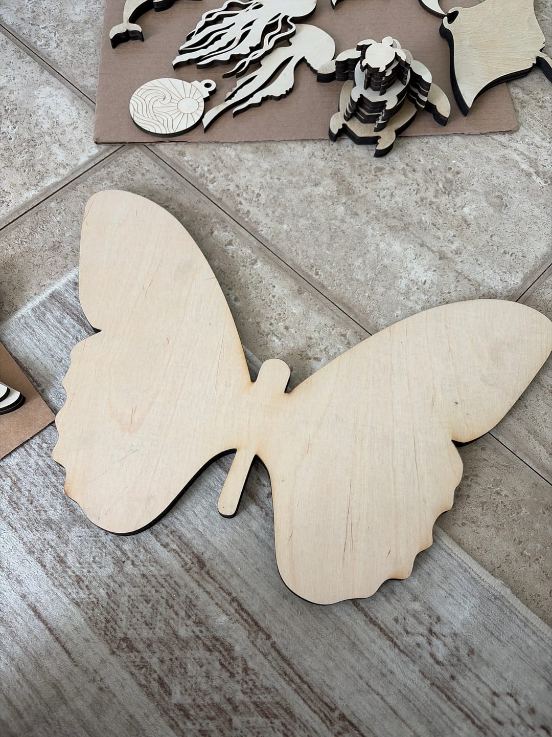 Customer photo review of Bigger Better | Unfinished Wood Butterfly Silhouette |  DIY Craft Cutout
