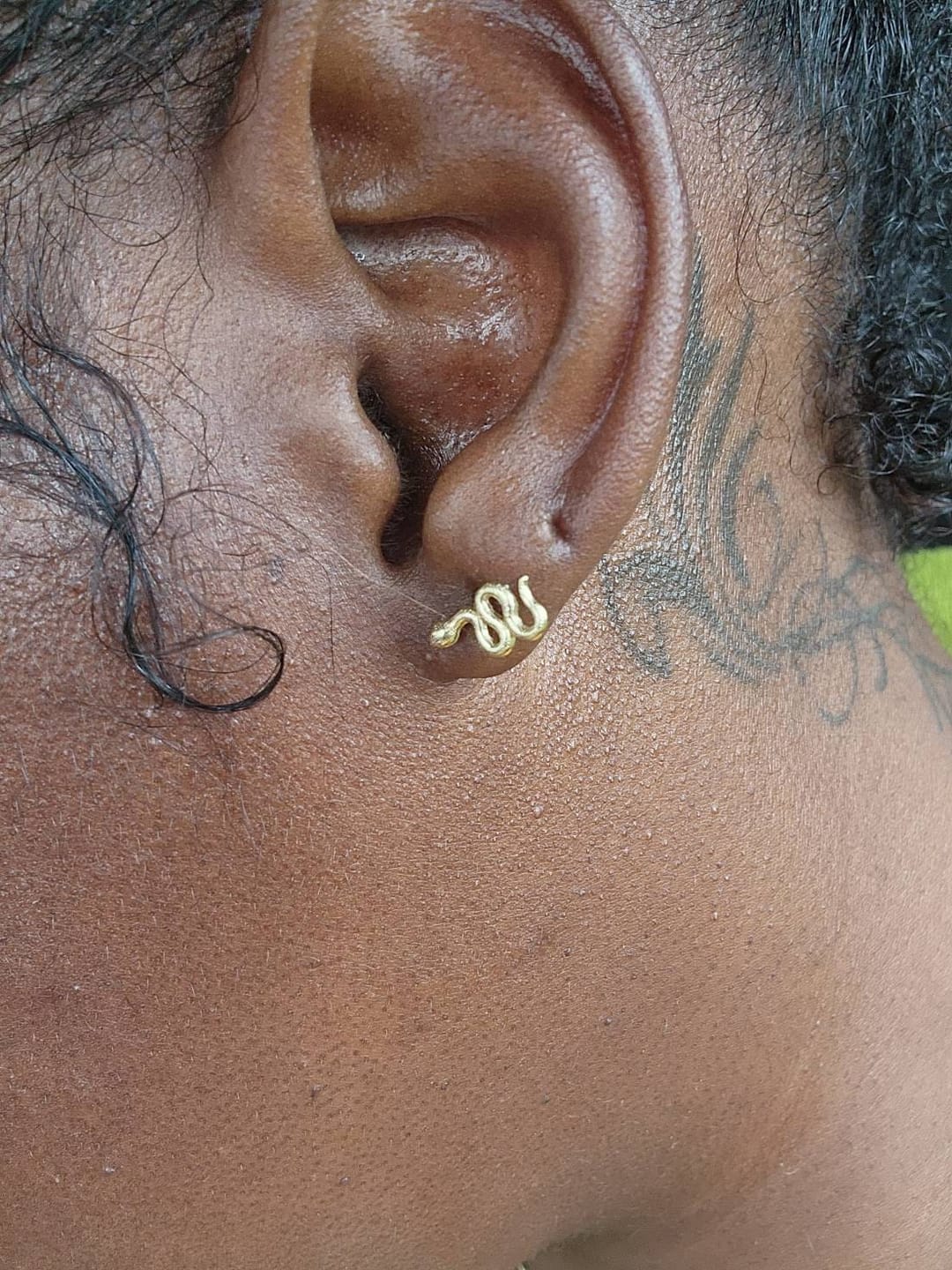 Customer photo review of 14K Gold Snake Stud Earrings