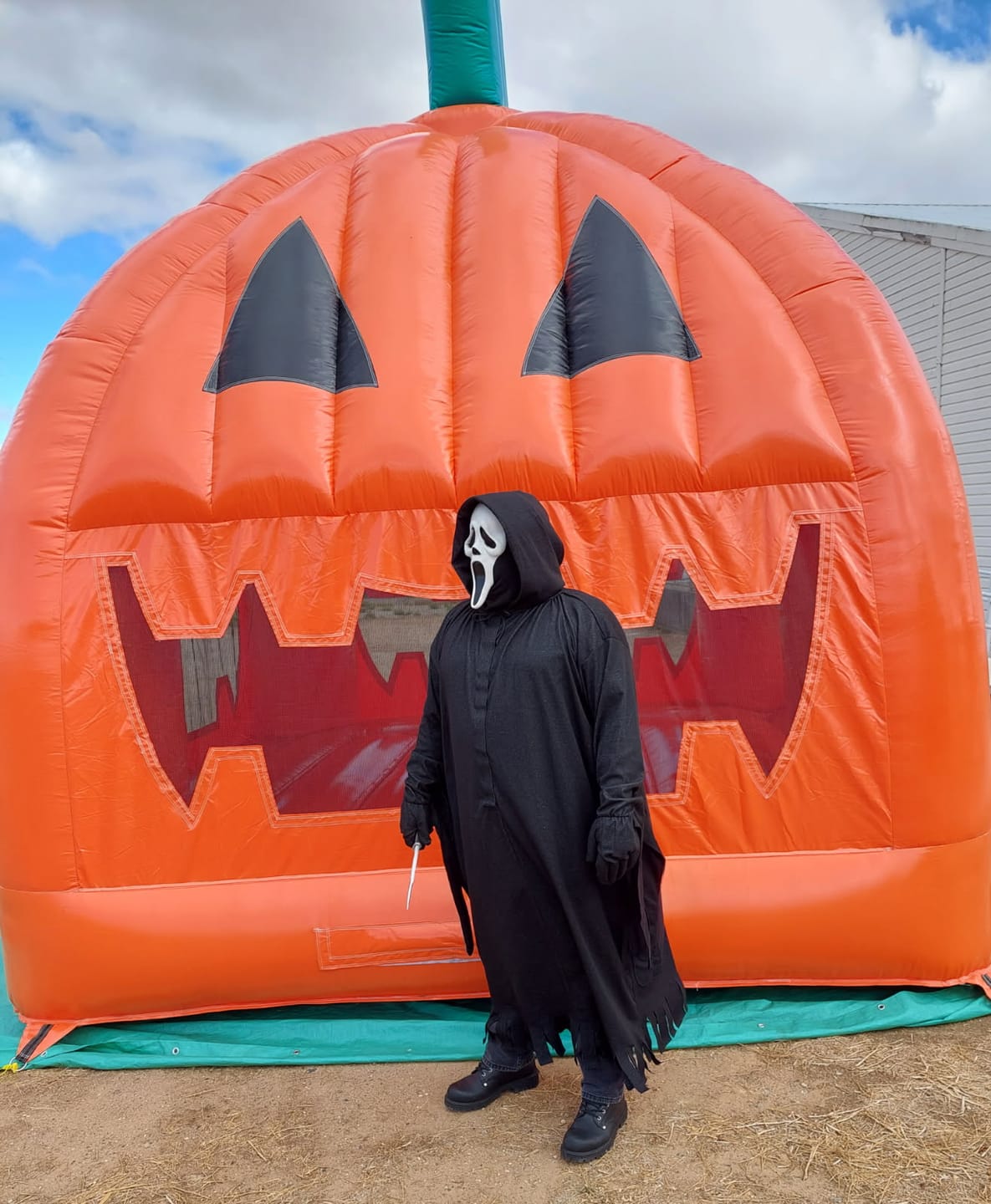 Customer photo review of Halloween Blow Up Pumpkin Hollow Inflatables Jumping Castle Fan Inflatable Jack O Lantern