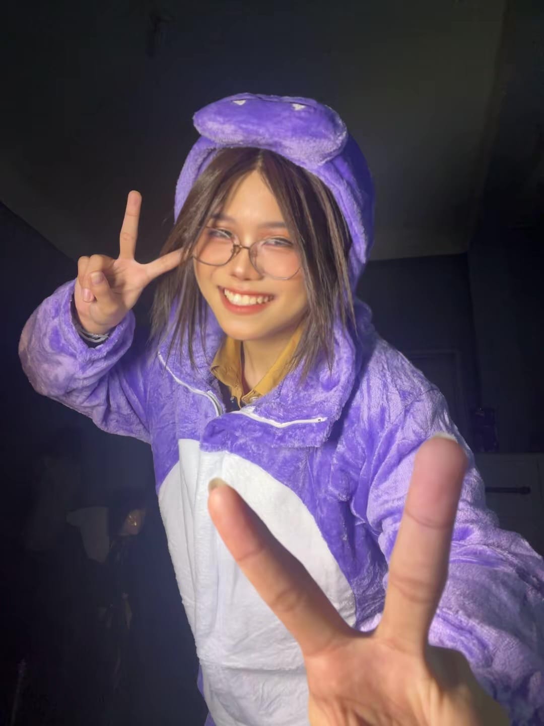 Customer photo review of OLAOLA Unisex Adult Plush Purple Dinosaur Animals Onesie Pajamas Warm Home One-Piece Sleepwear