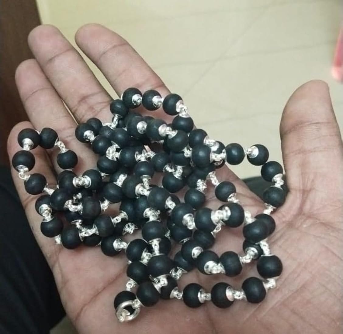 Customer photo review of Shaligram Mala – 100% Natural & Authentic