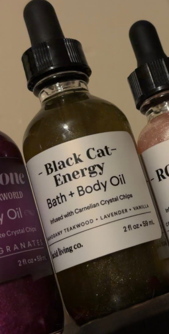 Customer photo review of Black Cat Energy Bath & Body Oil