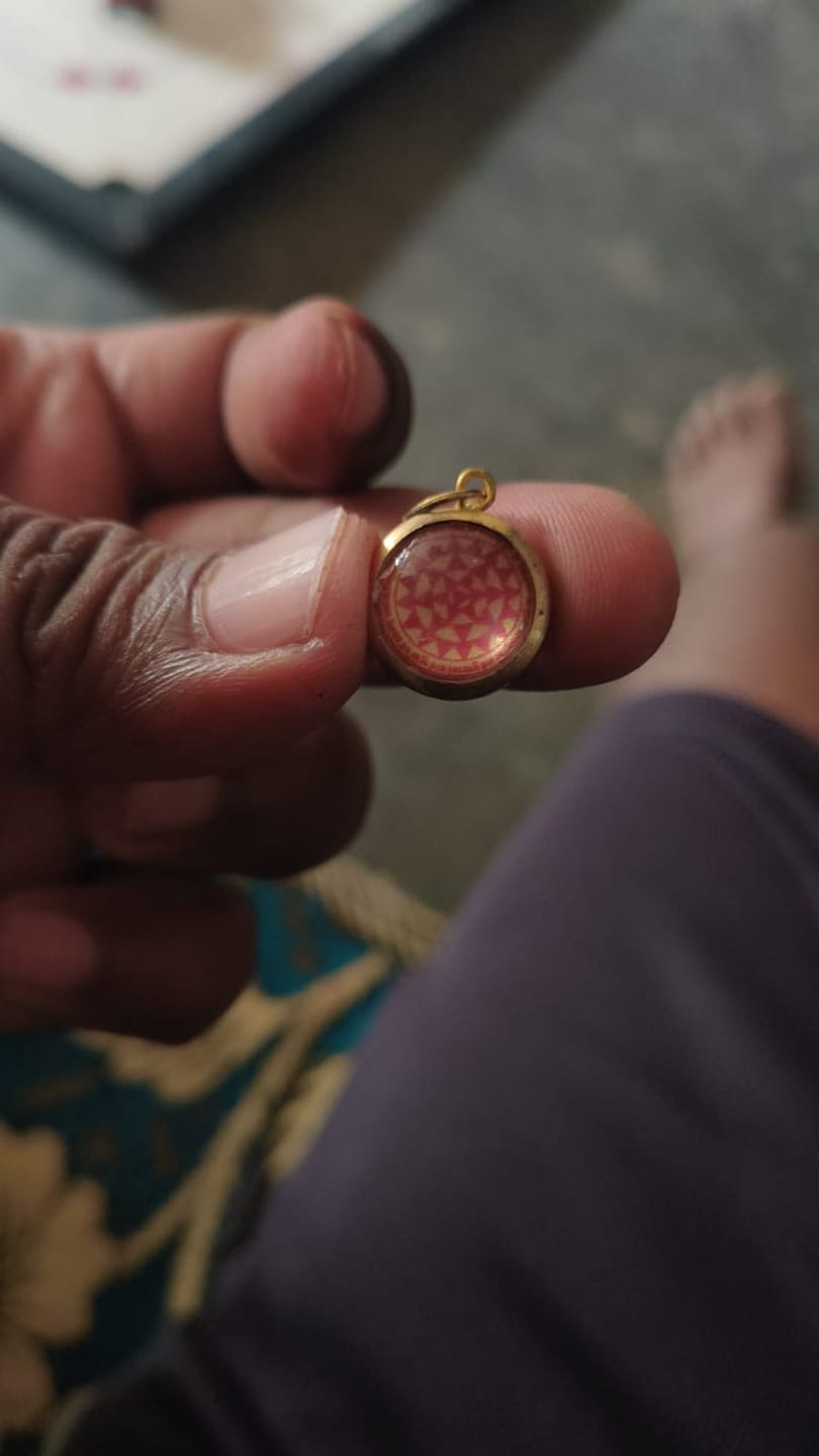 Customer photo review of Durga Bisa Yantra Locket – For Protection, Courage & Freedom from Fear