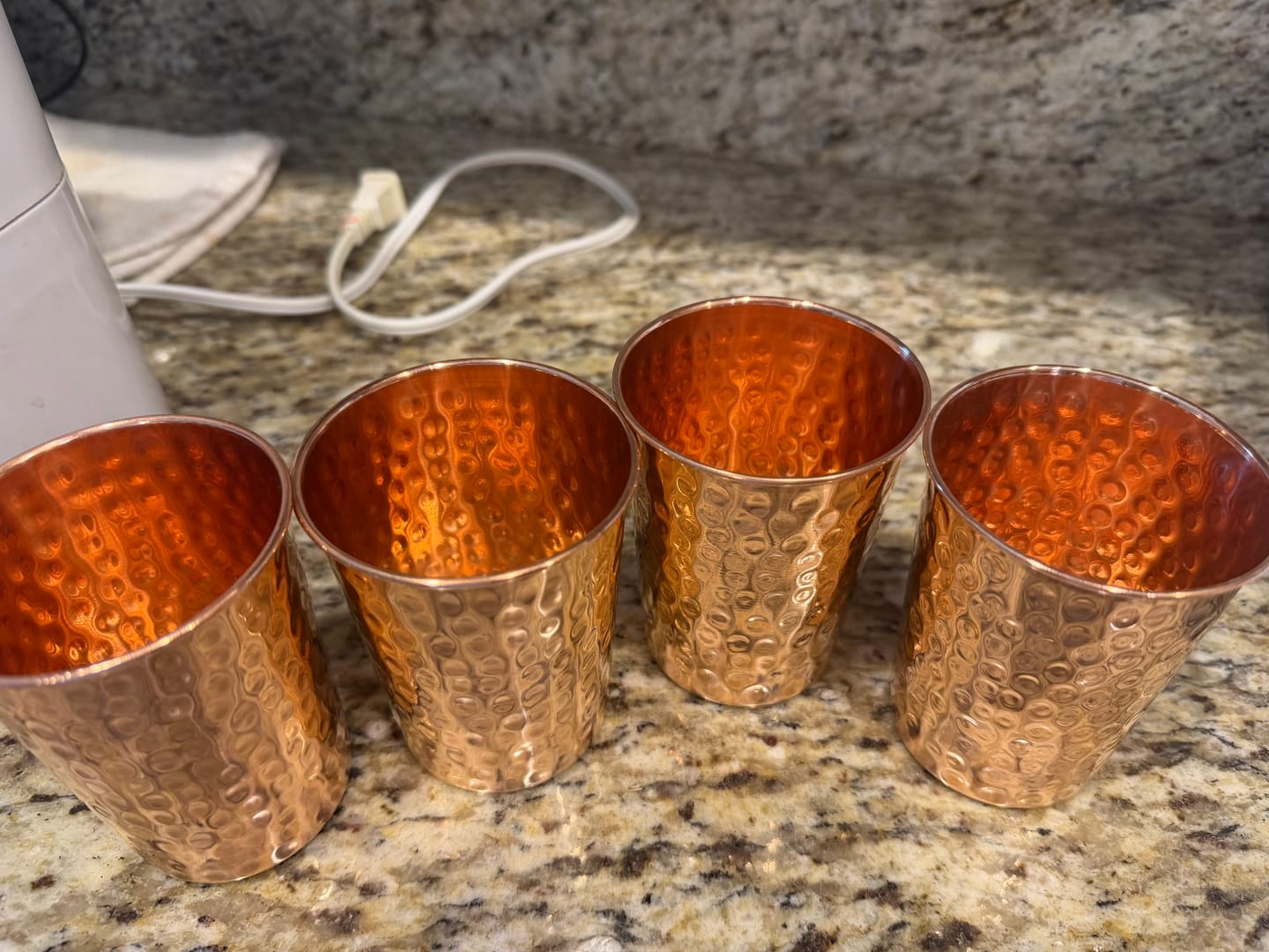 Customer photo review of Artisan Hammered Copper Glass Set