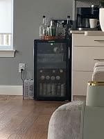 Customer photo review of Simzlife 4.5 Cu.ft Beverage Refrigerator and Cooler, 145 Can Mini fridge with Glass Door for Soda Beer Wine, Small Drink Dispenser with Digital Adjustable Thermostat for Home Office Bar