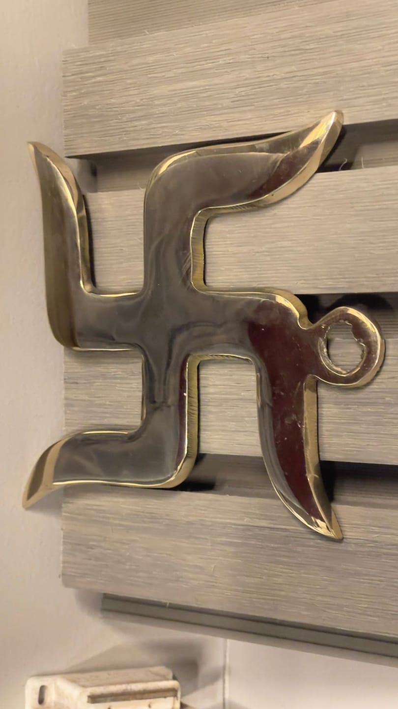 Customer photo review of Brass Swastik Wall Symbol | Vastu Remedy for Main Entrance & Auspicious Energy | 5 & 9 Inch