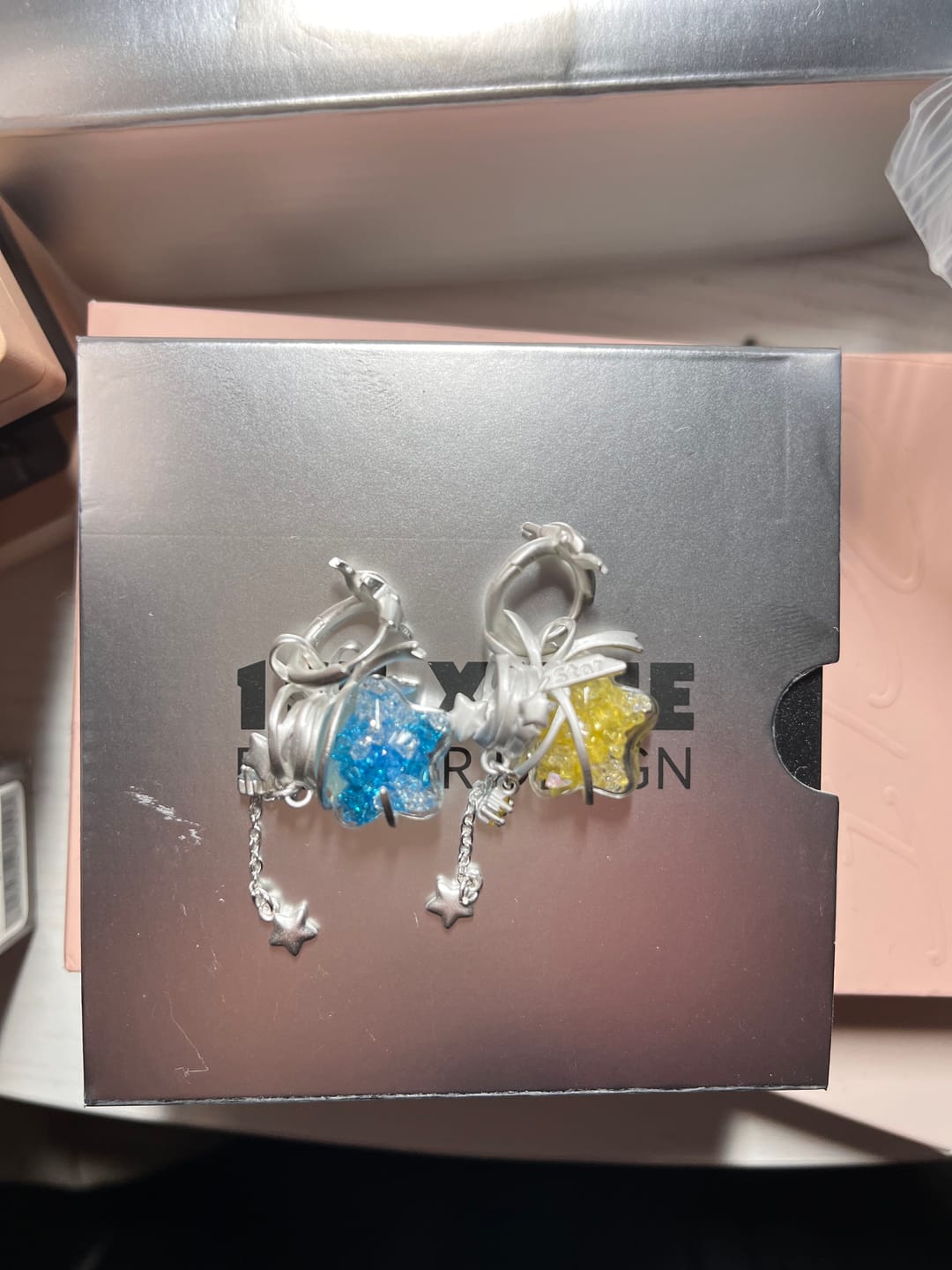 Customer photo review of "WISHING STAR" Platinum Plated Wishing Bottle Dangle Earrings