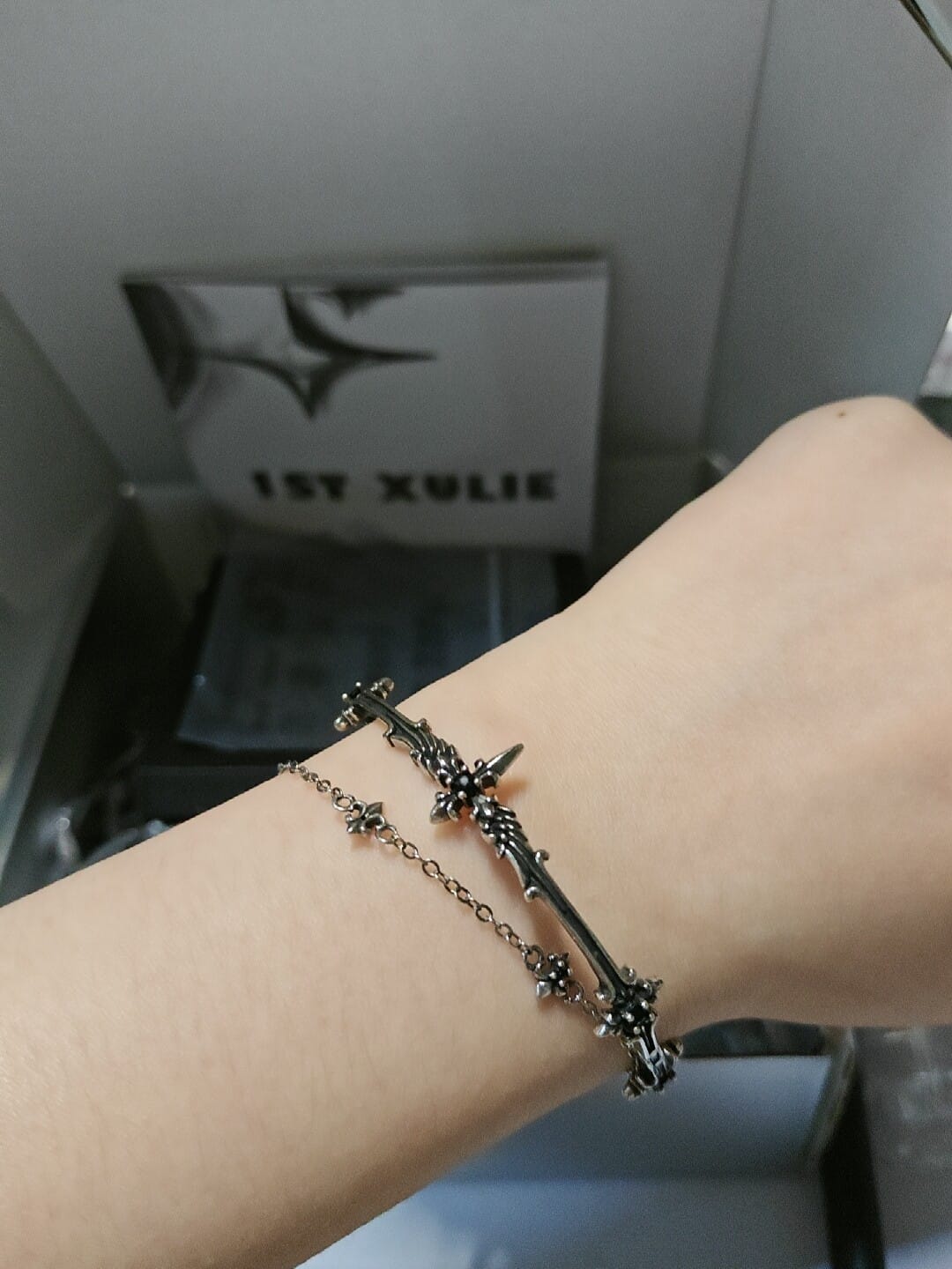 Customer photo review of "FALLEN ANGEL" Antiqued Silver Plated Vintage Fallen Angel Bangle, Statement Bracelet