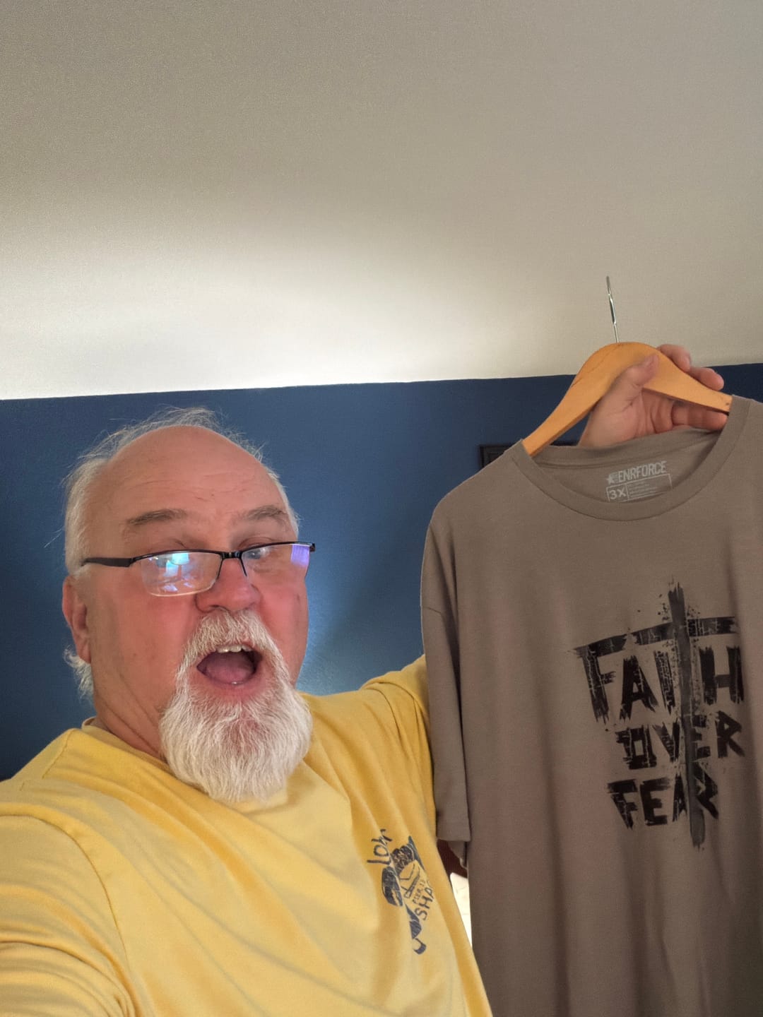 Customer photo review of Faith Over Fear Tee