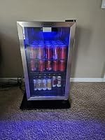 Customer photo review of Simzlife 4.5 Cu.ft Beverage Refrigerator and Cooler, 145 Can Mini fridge with Glass Door for Soda Beer Wine, Small Drink Dispenser with Digital Adjustable Thermostat for Home Office Bar