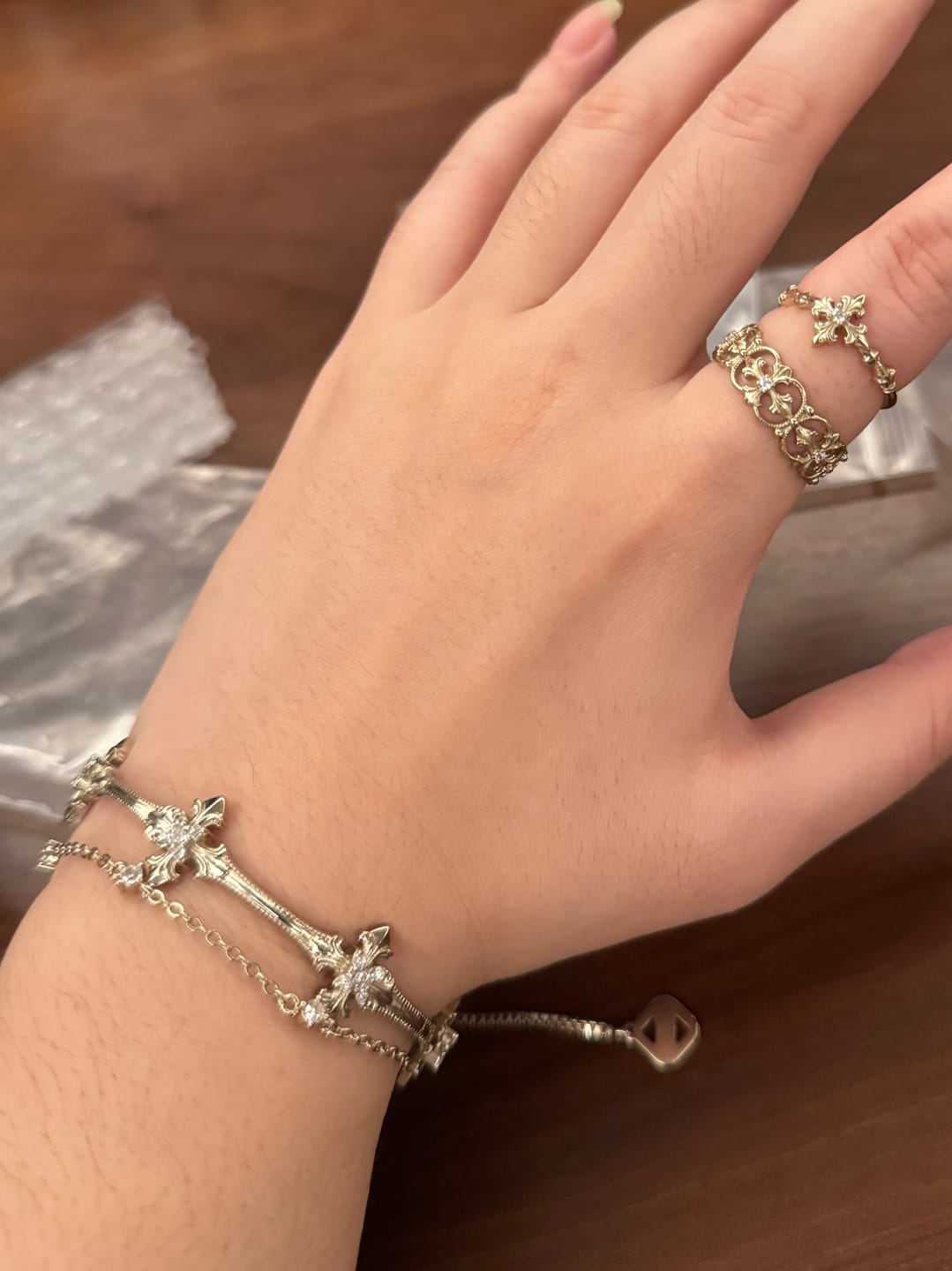 Customer photo review of "Bastet" 14K Gold Plated Vintage Iris Charm Bracelet, Zirconia