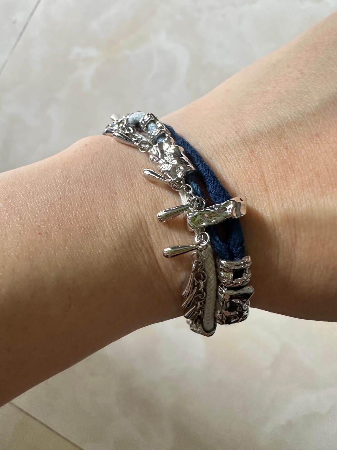 Customer photo review of "MIAO" Platinum Plated Ethnic Braided Tassel Bracelet, Statement Woven Handchain