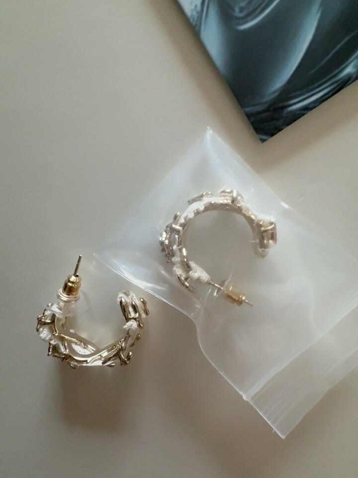 Customer photo review of "WISHING STAR" Rhodium Plated Zirconia Wishing Star Stud Earrings, Celestial Star Earrings