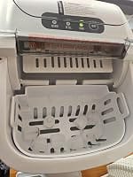 Customer photo review of Simzlife Portable Countertop Ice Maker, 26 Lbs/24H, 9 Bullet-Shaped Ice Cubes in 6 Minutes, Self-Cleaning Ice Machine, Red