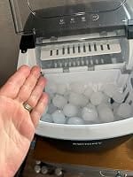 Customer photo review of Simzlife Portable Countertop Ice Maker, 26 Lbs/24H, 9 Bullet-Shaped Ice Cubes in 6 Minutes, Self-Cleaning Ice Machine, Red