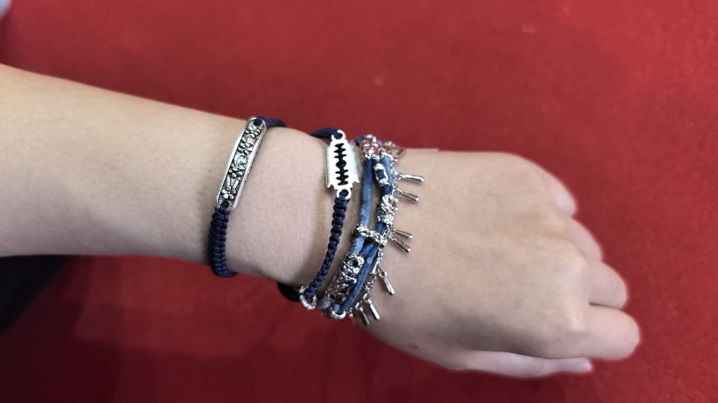 Customer photo review of "MIAO" Platinum Plated Ethnic Braided Tassel Bracelet, Statement Woven Handchain