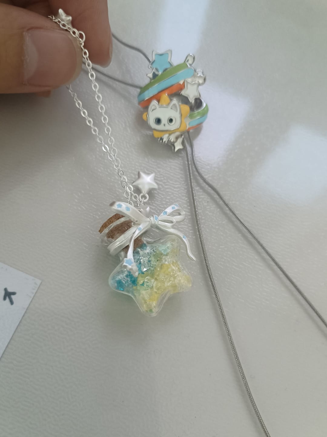 Customer photo review of “WISHING STAR” Platinum Plated Wishing Bottle Star Statement Pendant Necklace
