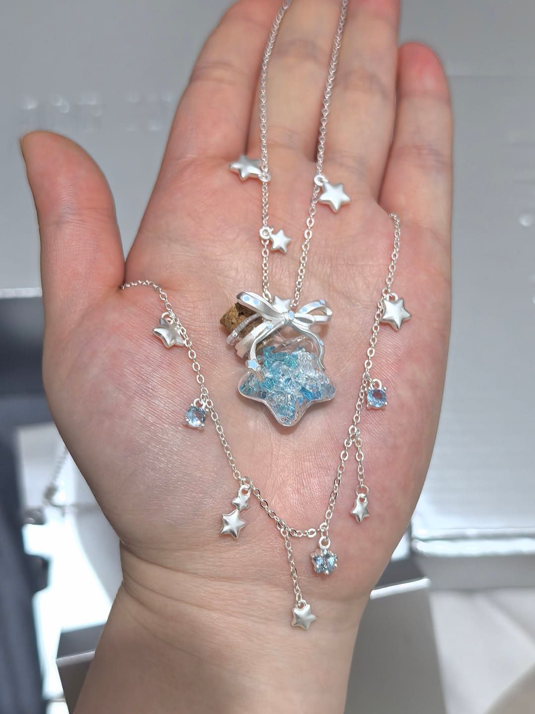 Customer photo review of “WISHING STAR” Platinum Plated Wishing Bottle Star Statement Pendant Necklace