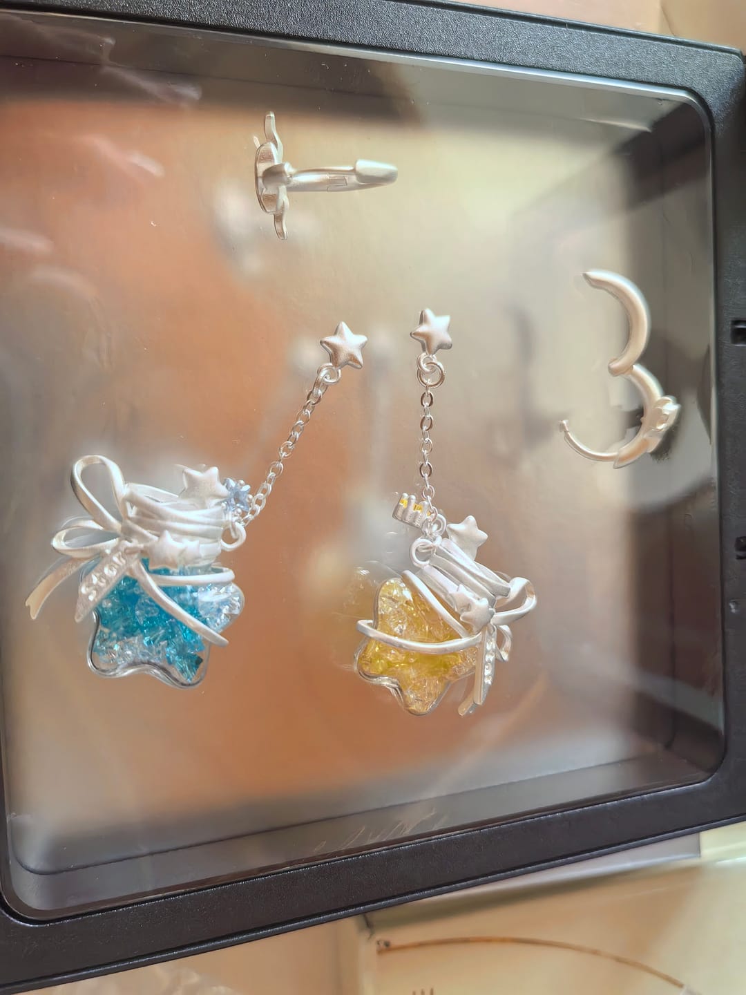 Customer photo review of "WISHING STAR" Platinum Plated Wishing Bottle Dangle Earrings