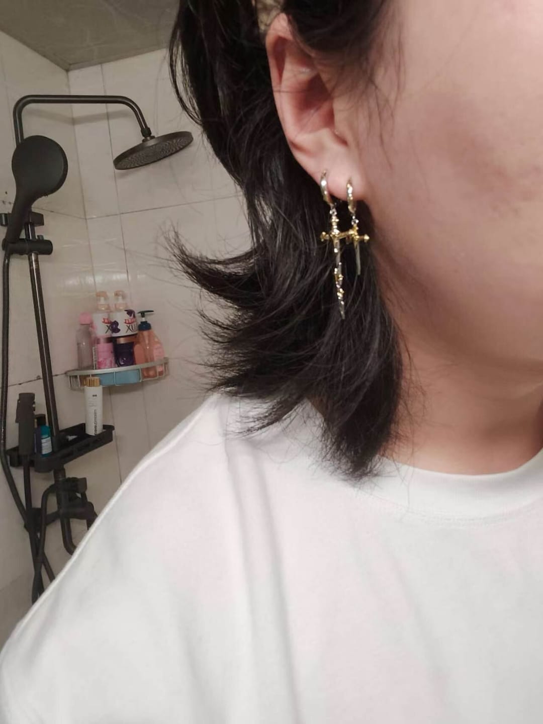 Customer photo review of "Knight's Oath" 18K Gold Plated Sword Dangle Hoop Earrings