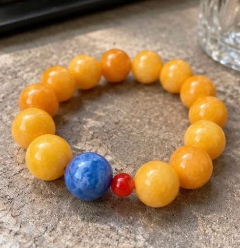 Customer photo review of Topaz, Blue Kyanite & Red Agate Energy Bracelet – Abundance, Clear Communication & Stability