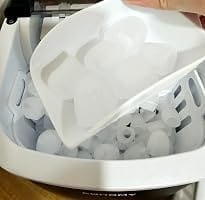 Customer photo review of Simzlife Portable Countertop Ice Maker, 26 Lbs/24H, 9 Bullet-Shaped Ice Cubes in 6 Minutes, Self-Cleaning Ice Machine, Red