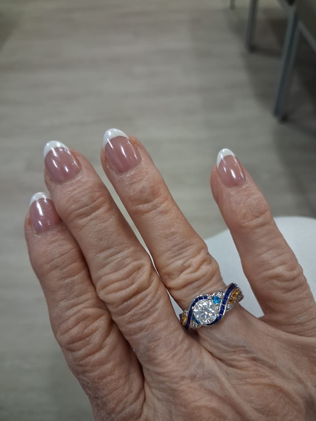 Customer photo review of Starry Night Moissanite Artistic Swirl Accent Engagement Ring
