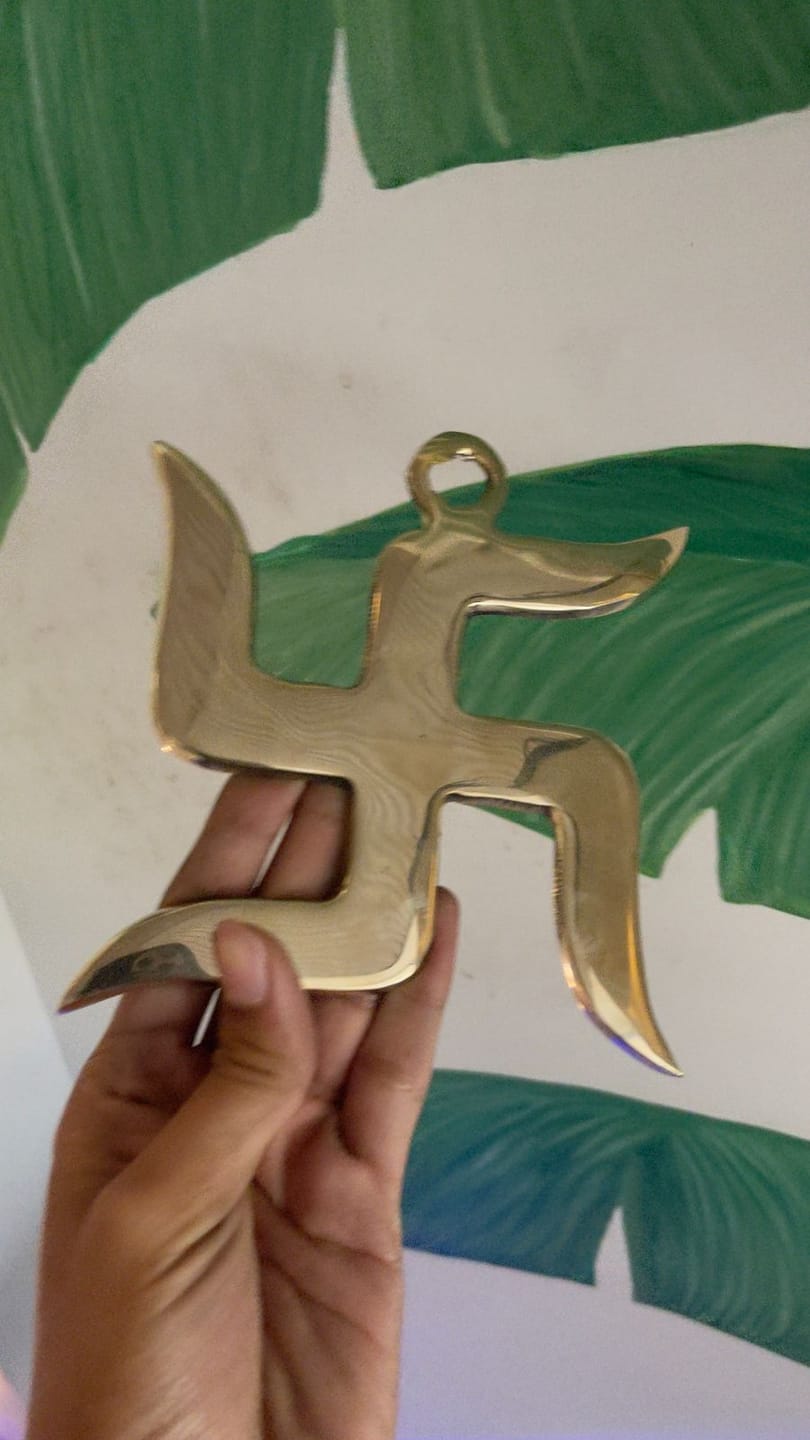 Customer photo review of Brass Swastik Wall Symbol | Vastu Remedy for Main Entrance & Auspicious Energy | 5 & 9 Inch