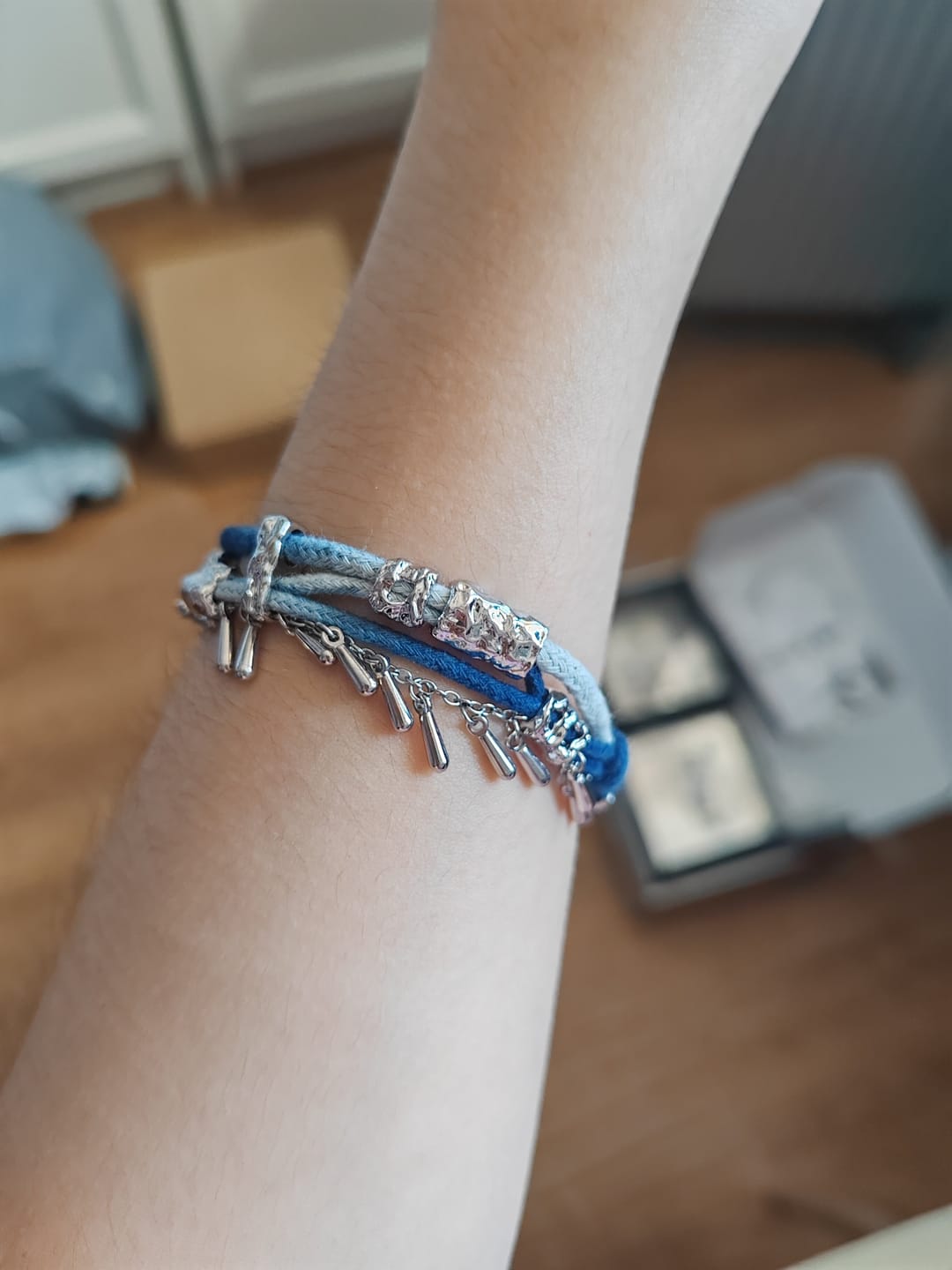 Customer photo review of "MIAO" Platinum Plated Ethnic Braided Tassel Bracelet, Statement Woven Handchain