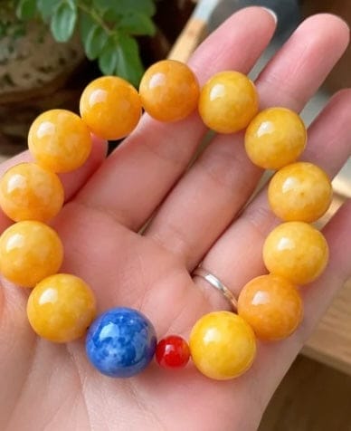 Customer photo review of Topaz, Blue Kyanite & Red Agate Energy Bracelet – Abundance, Clear Communication & Stability