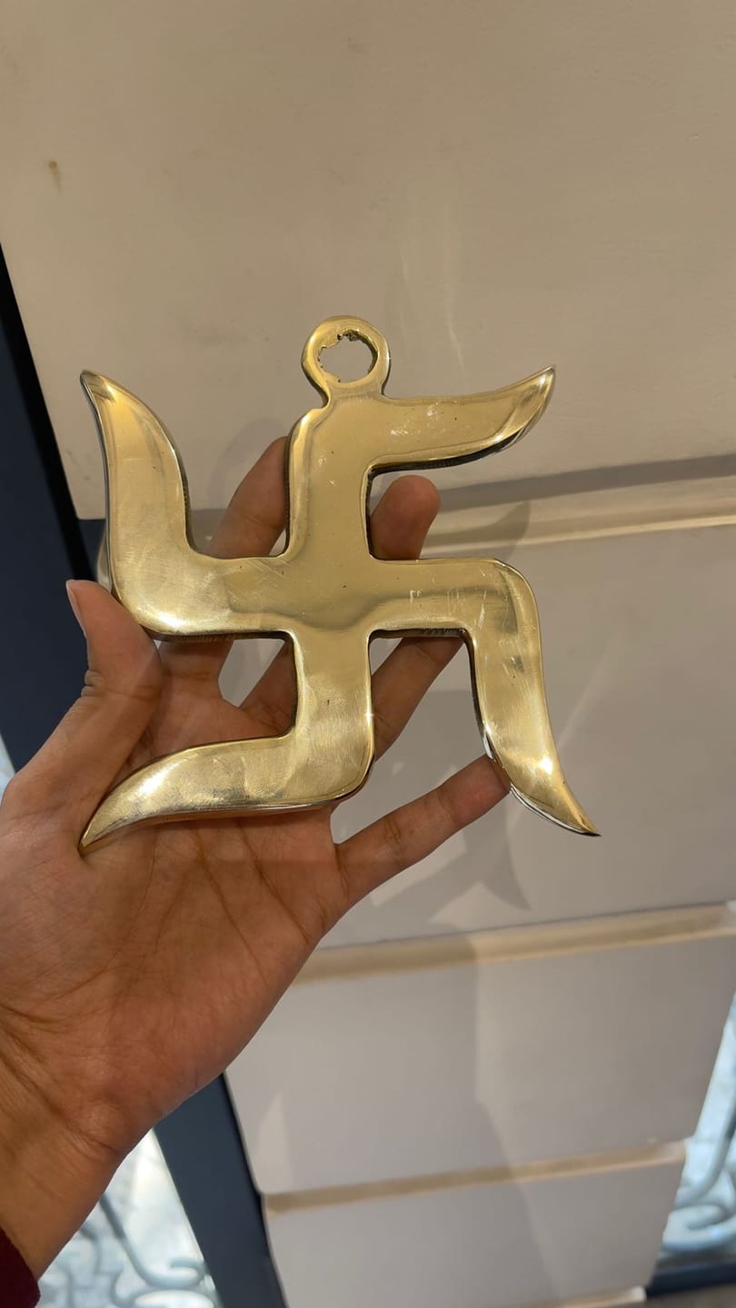 Customer photo review of Brass Swastik Wall Symbol | Vastu Remedy for Main Entrance & Auspicious Energy | 5 & 9 Inch