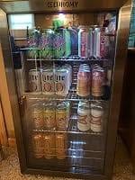 Customer photo review of Simzlife 4.5 Cu.ft Beverage Refrigerator and Cooler, 145 Can Mini fridge with Glass Door for Soda Beer Wine, Small Drink Dispenser with Digital Adjustable Thermostat for Home Office Bar