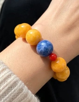 Customer photo review of Topaz, Blue Kyanite & Red Agate Energy Bracelet – Abundance, Clear Communication & Stability
