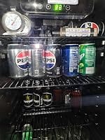 Customer photo review of Simzlife 4.5 Cu.ft Beverage Refrigerator and Cooler, 145 Can Mini fridge with Glass Door for Soda Beer Wine, Small Drink Dispenser with Digital Adjustable Thermostat for Home Office Bar