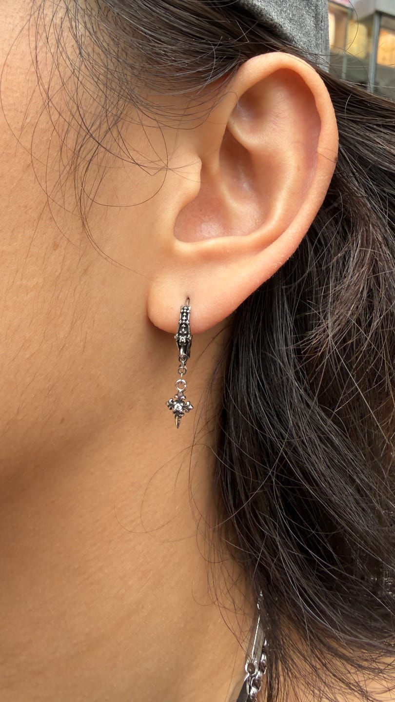 Customer photo review of "Irises" 925 Sterling Silver Gothic Oxidized Dangle Cross Earrings
