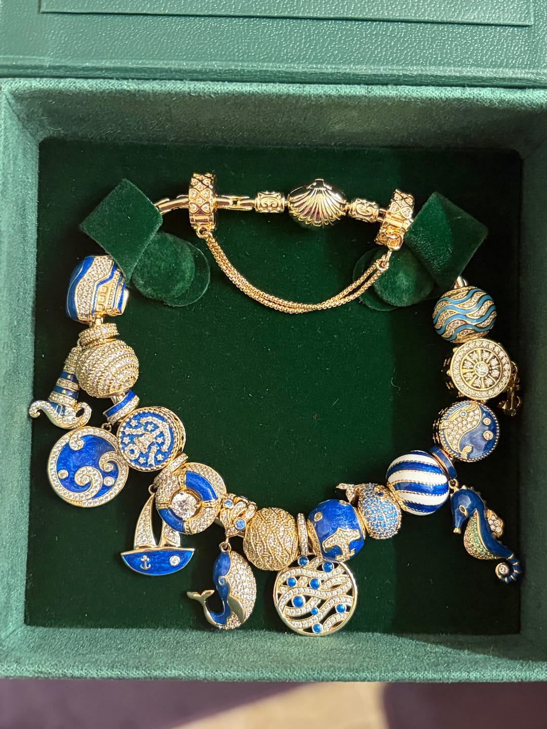 Customer photo review of Sterling Silver Oceanic Journey Charms Bracelet Set With Enamel In 14K Gold Plated (Includes bracelet and all charms shown)