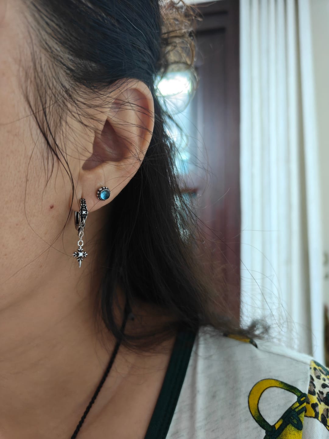 Customer photo review of "Irises" 925 Sterling Silver Gothic Oxidized Dangle Cross Earrings
