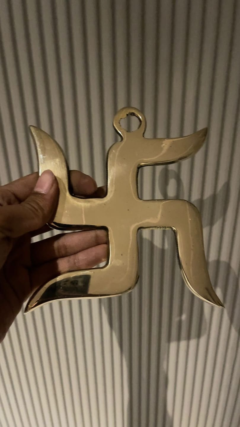 Customer photo review of Brass Swastik Wall Symbol | Vastu Remedy for Main Entrance & Auspicious Energy | 5 & 9 Inch