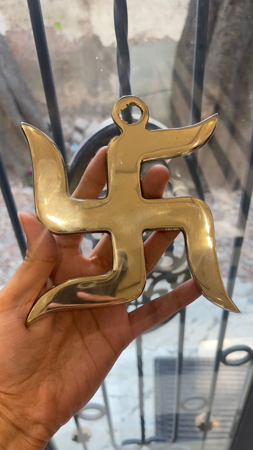 Customer photo review of Brass Swastik Wall Symbol | Vastu Remedy for Main Entrance & Auspicious Energy | 5 & 9 Inch