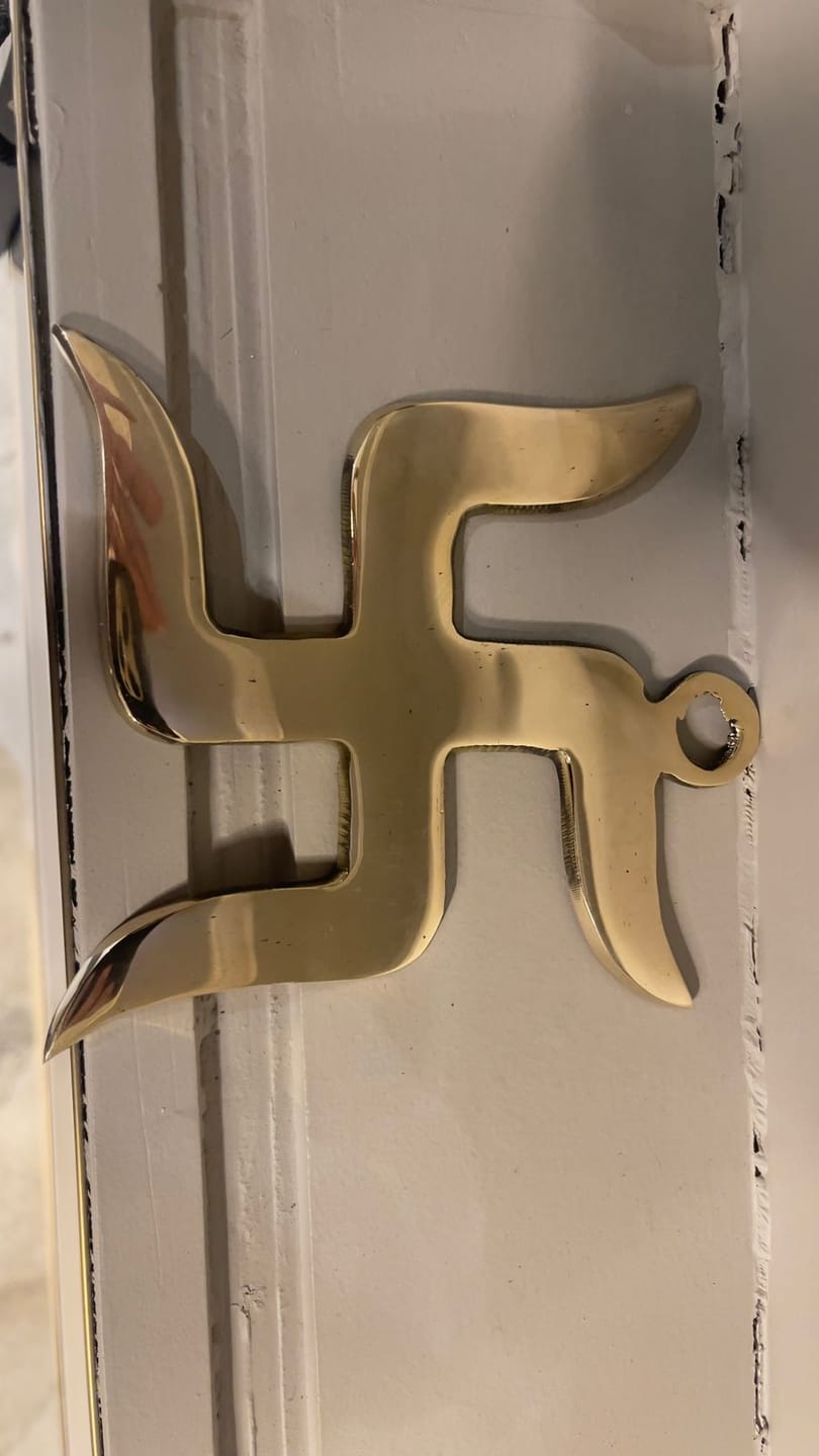 Customer photo review of Brass Swastik Wall Symbol | Vastu Remedy for Main Entrance & Auspicious Energy | 5 & 9 Inch