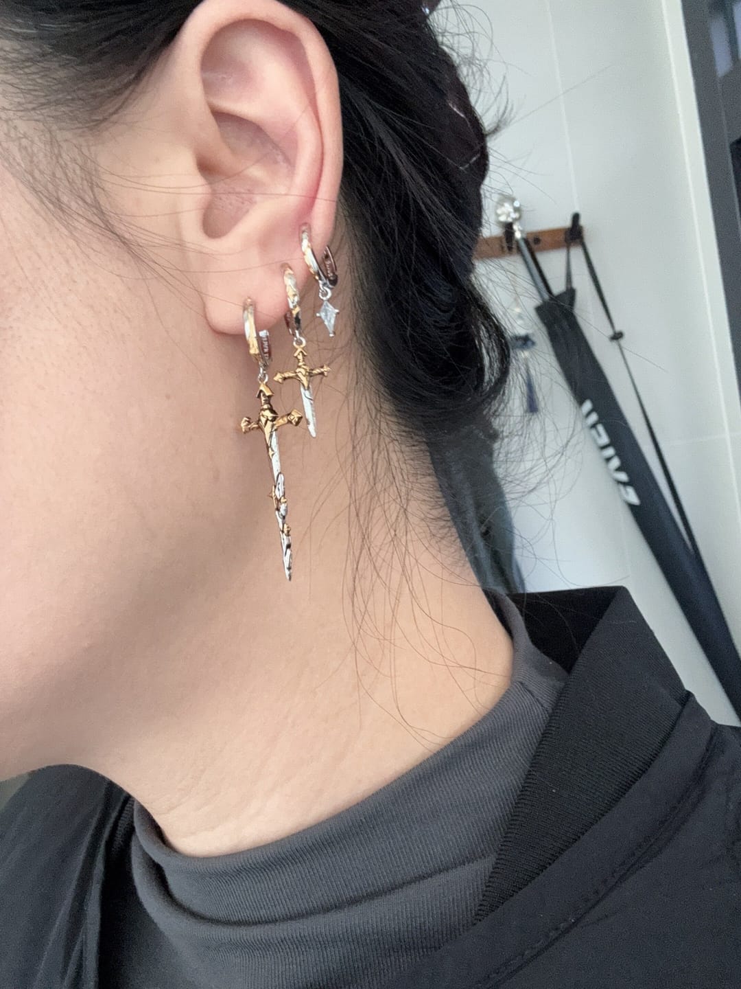 Customer photo review of "Knight's Oath" 18K Gold Plated Sword Dangle Hoop Earrings