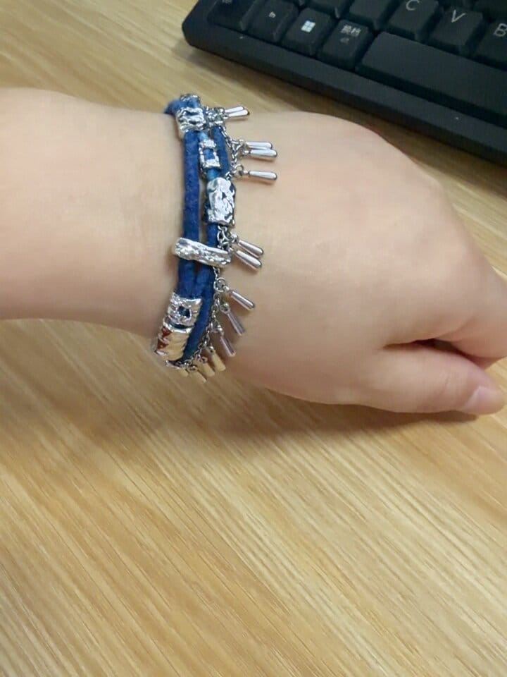 Customer photo review of "MIAO" Platinum Plated Ethnic Braided Tassel Bracelet, Statement Woven Handchain