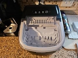 Customer photo review of Simzlife Portable Countertop Ice Maker, 26 Lbs/24H, 9 Bullet-Shaped Ice Cubes in 6 Minutes, Self-Cleaning Ice Machine, Red