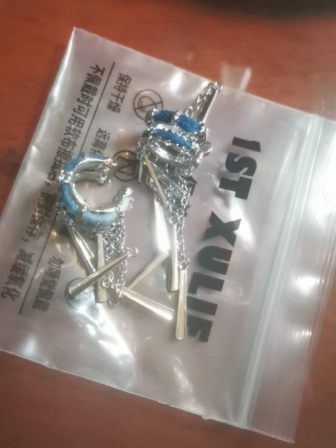 Customer photo review of "MIAO" Platinum Plated Miao Ethnic Tassel Ear Cuffs, Non-Pierced Dangle Earrings