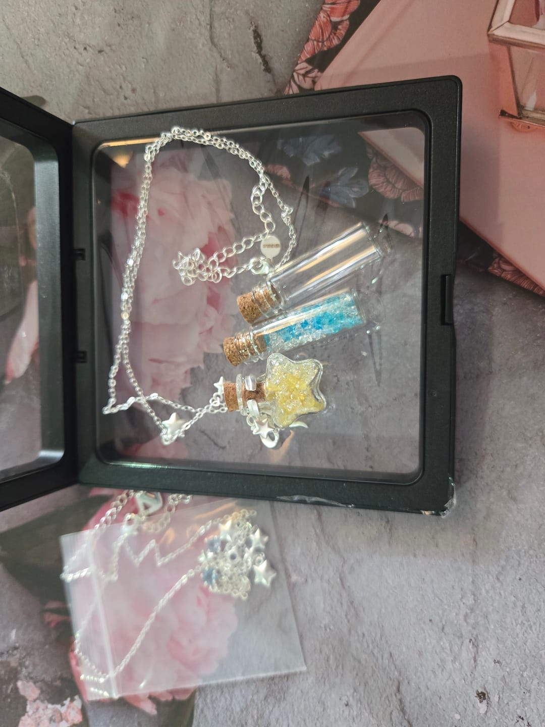 Customer photo review of “WISHING STAR” Platinum Plated Wishing Bottle Star Statement Pendant Necklace