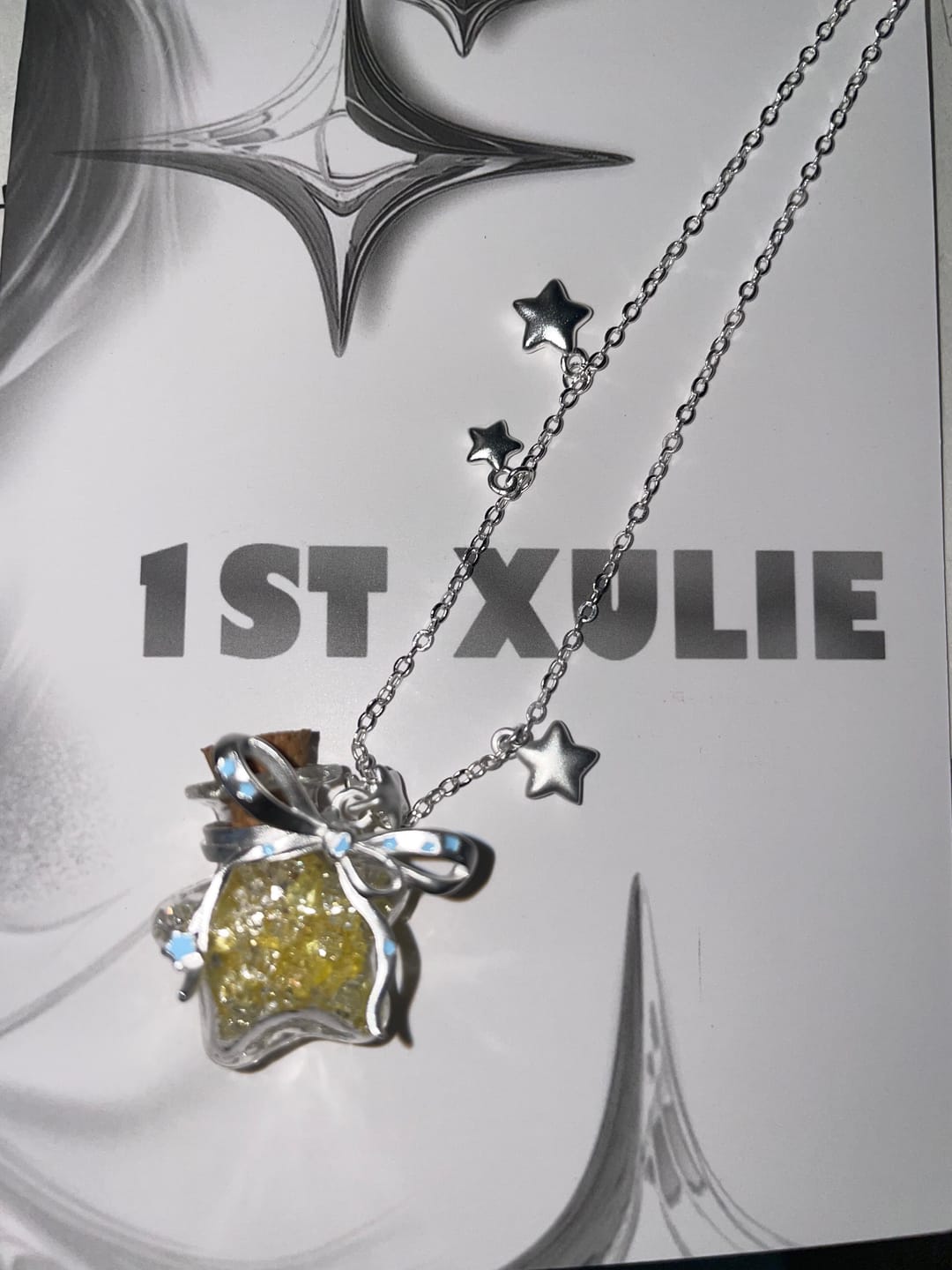 Customer photo review of “WISHING STAR” Platinum Plated Wishing Bottle Star Statement Pendant Necklace