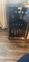 Customer photo review of Simzlife 4.5 Cu.ft Beverage Refrigerator and Cooler, 145 Can Mini fridge with Glass Door for Soda Beer Wine, Small Drink Dispenser with Digital Adjustable Thermostat for Home Office Bar