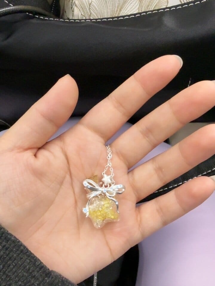 Customer photo review of “WISHING STAR” Platinum Plated Wishing Bottle Star Statement Pendant Necklace
