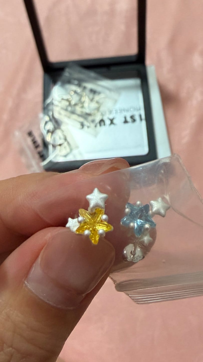 Customer photo review of "WISHING STAR" Rhodium Plated Zirconia Wishing Star Stud Earrings, Celestial Star Earrings
