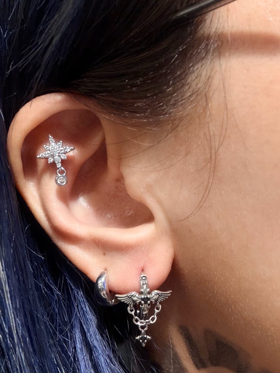 Customer photo review of "Irises" Platinum Plated Vintage Angel Wing Huggie Hoop Drop Earrings